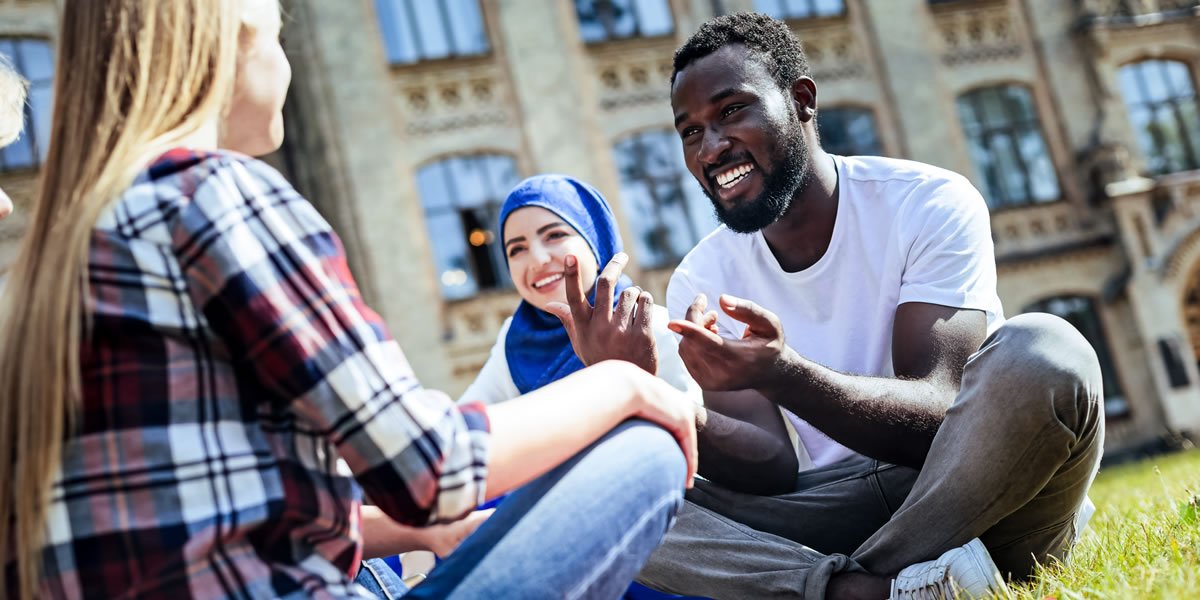 Students sat talking outside University
